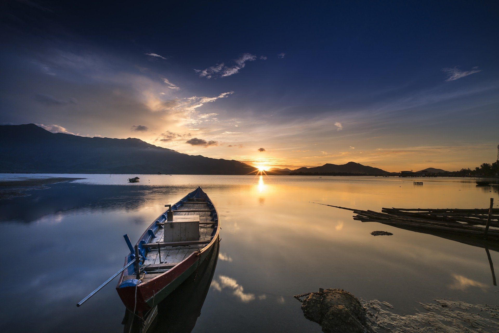 Boat At Sunset